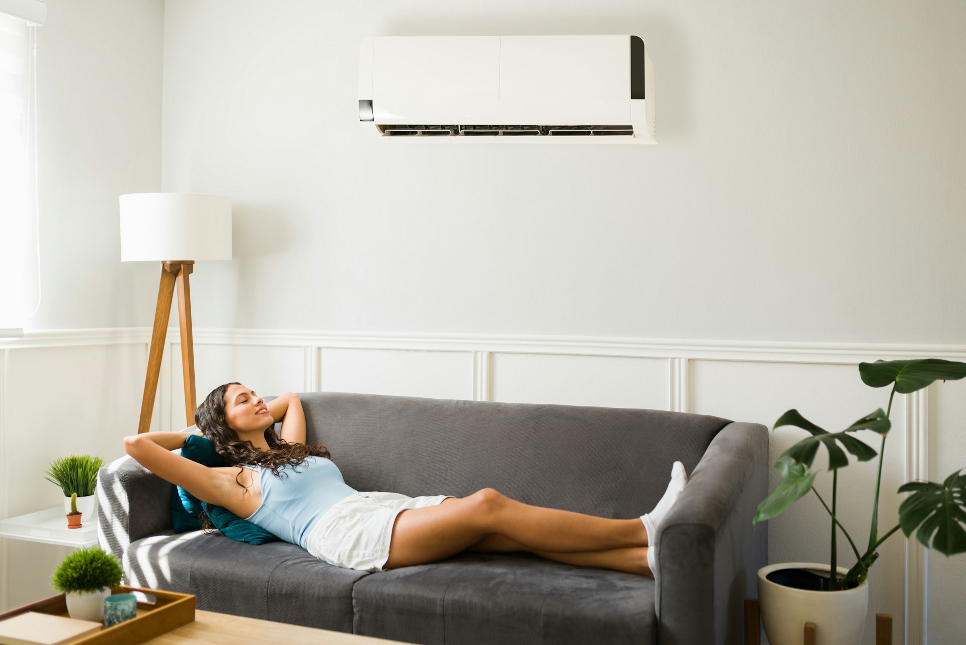 woman in the living room with ac